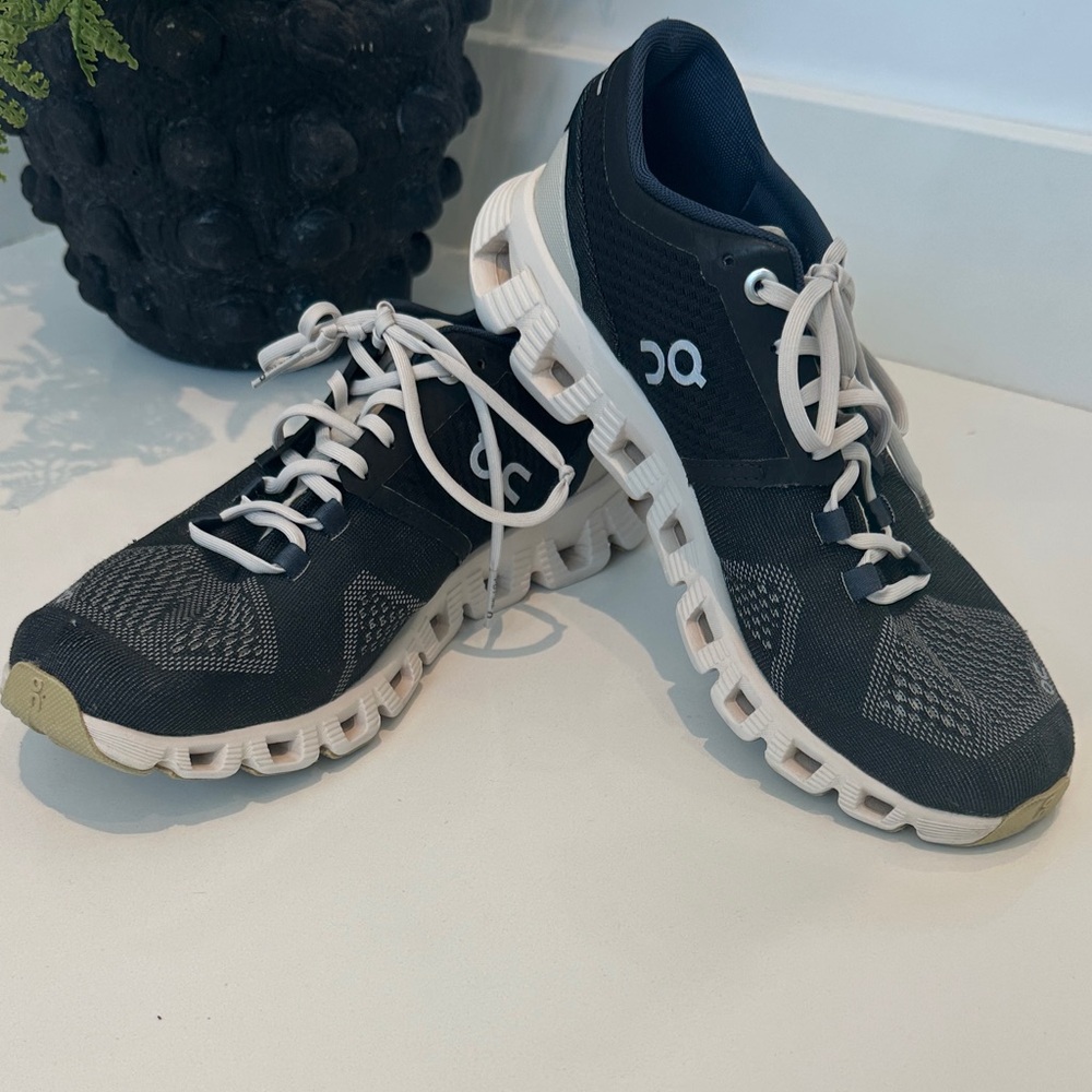 On Running Black and White Sneakers